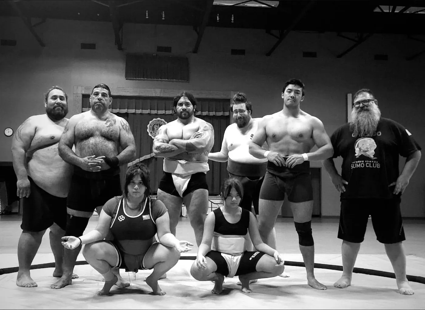 Club members lined up on the dohyo for a group photo